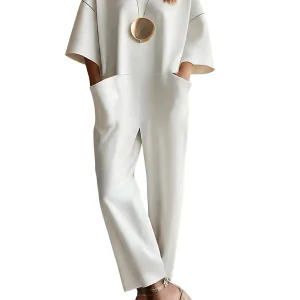 Vid jumpsuit för dam med rund halsringning